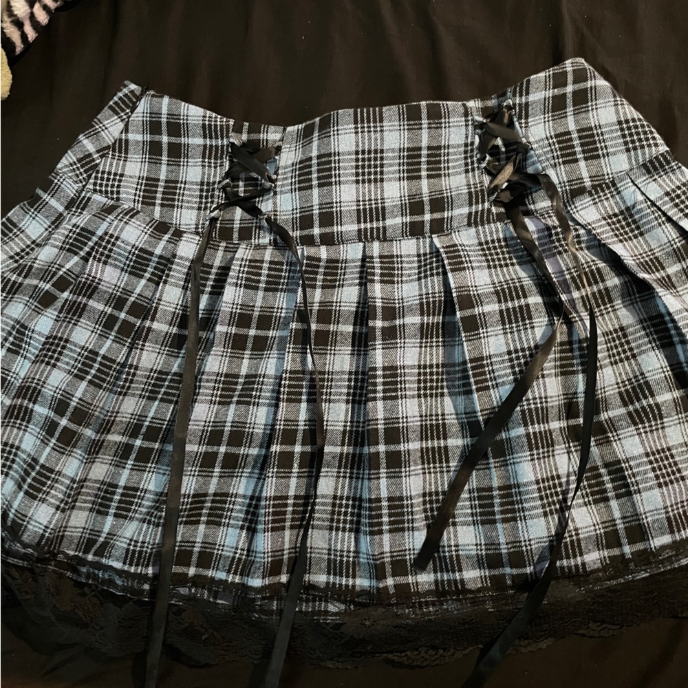 Blue plaid skirt with lace up design